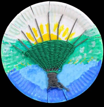 Weaving, yarn, paint and oil pastel on paper plate by Nadhira Shaik Abdul Kader, Year 6, Sirius College Student artwork of a tree weaving