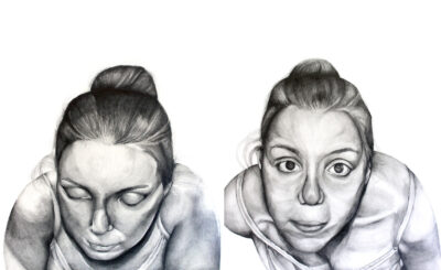 Greylead pencil on paper by Monica Sestito, Year 11, Sacre Coeur Student artwork of a portrait of a girl looking down and up