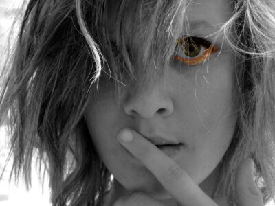 Photography by Alara Baldwin, Alexandra Phillips, Chelsea Hillas, Emily Kalafatis, Furat Alsabti, Gabbie Cirillo, Georgie Evans, Lauren Minicozzi, Margot Craig, Melanie Nixon, Mikaela Cowan, Natalie Sakarintr, Paul Prato, Rebecca Brun and Sarah Mitchell, Year 10, Goulburn Valley Grammar School Student photograph of a girl with orange eyeliner