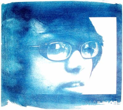 Cyanotype on paper by Sally Maydom, Year 11, St Margaret's Berwick Grammar Student artwork of a portrait of a girl in blue